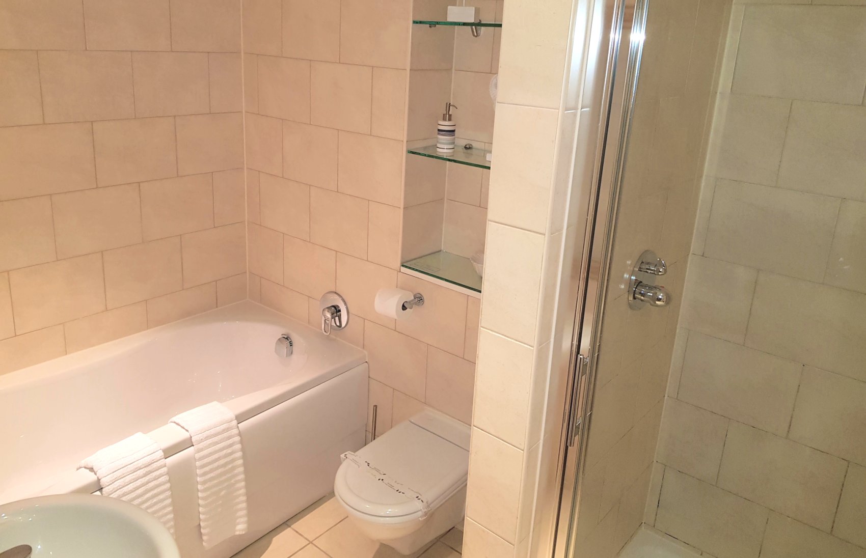 Luxury bathroom with separate bath and walk in shower